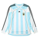 camisa retrô argentina, camisa argentina 2006, argentina manga longa, camisa copa 2006, camisa albiceleste retrô, uniforme histórico argentina, escudo bordado argentina, camisa retrô manga longa, copa do mundo 2006, camisa masculina argentina

